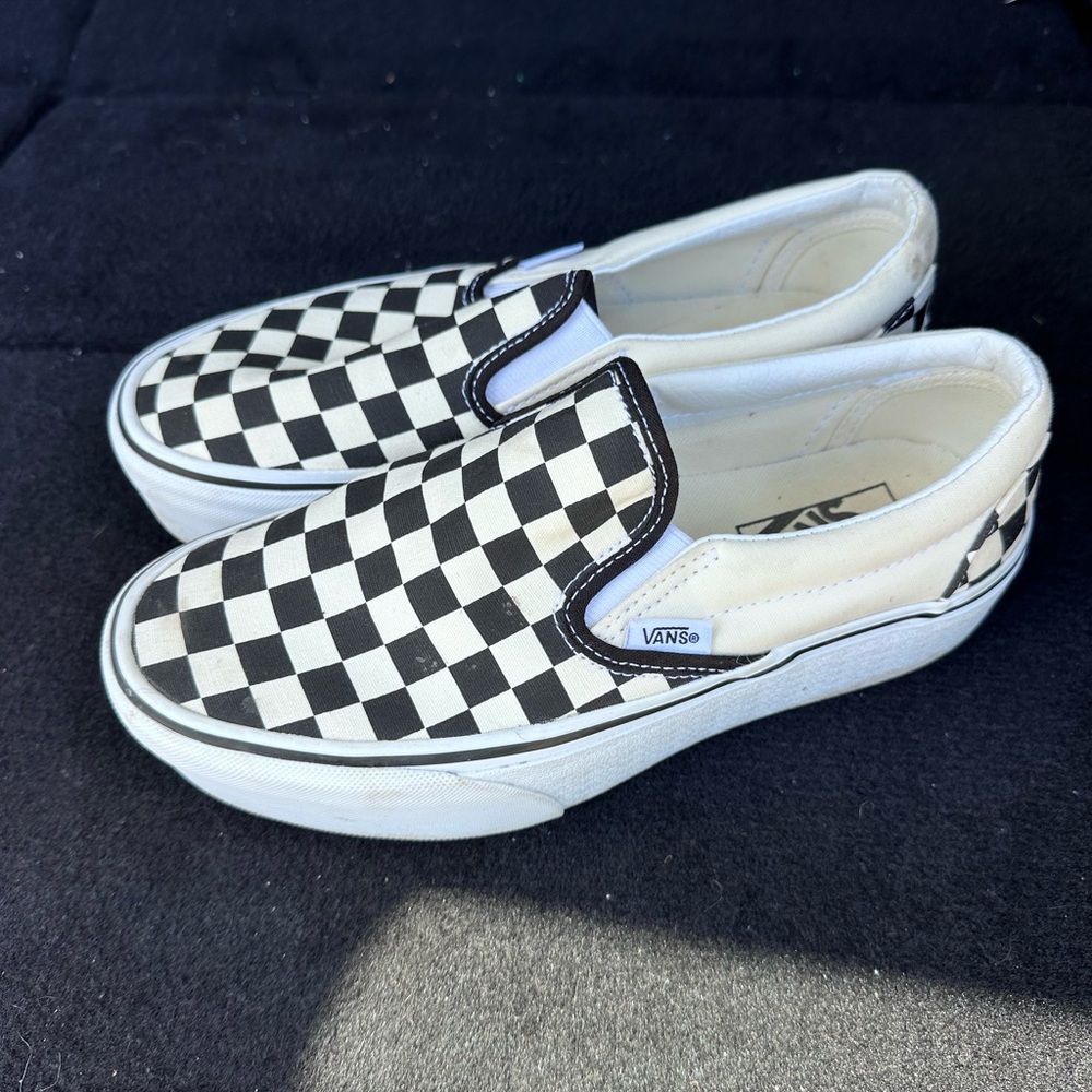 Vans Black and White Canvas Slip-On Sneakers